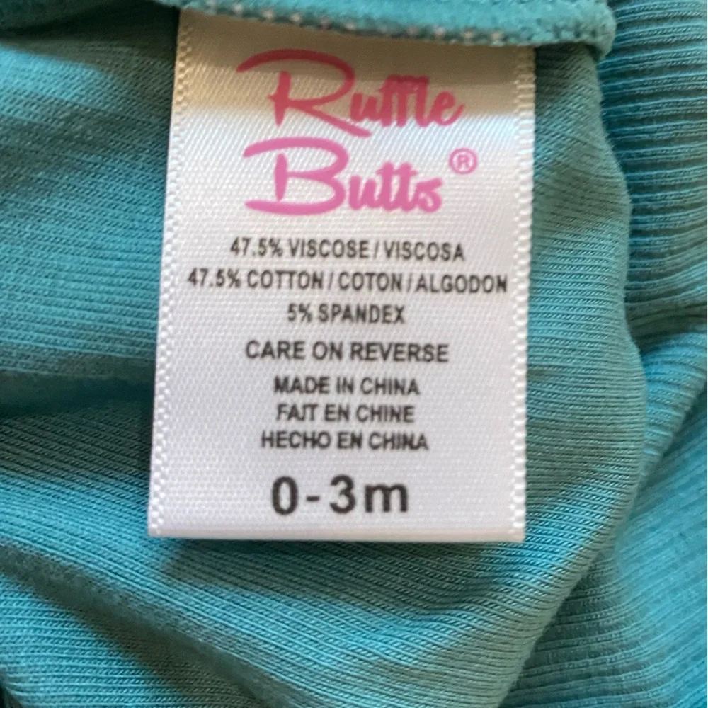NWT RuffleButts Brittany Blue Rib Knit Long Sleeve Flutter Ruffle Bodysuit, 0-3M